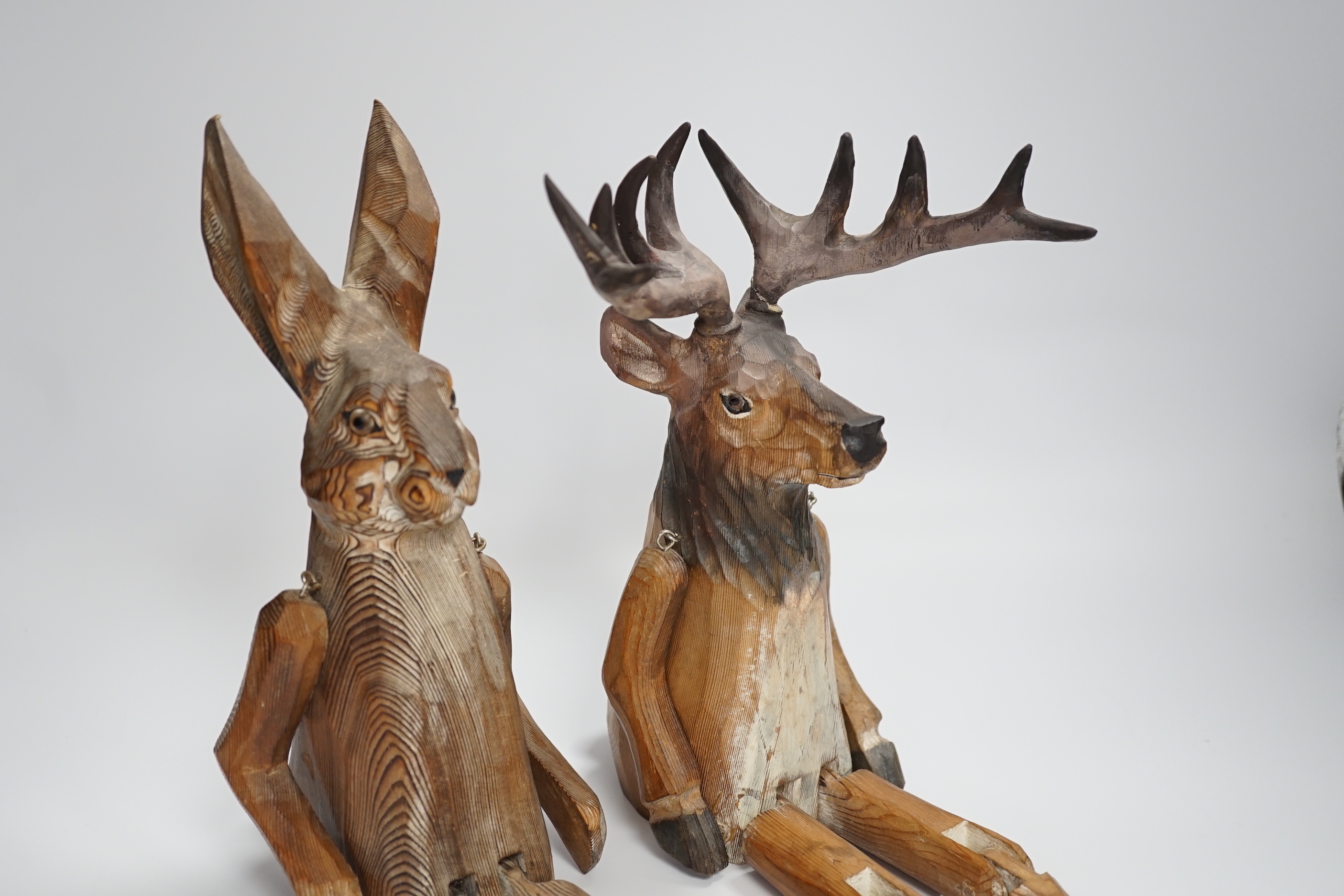 A of novelty jointed carved wooden Deer and similar Hare - 43cm